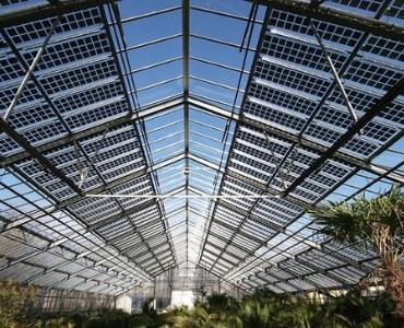 Vegetable greenhouse with solar panels