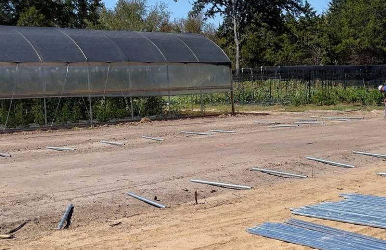 Greenhouse floor and ground coverings