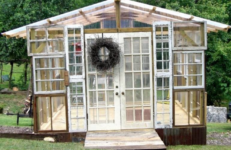 Vegetable greenhouse from old windows and doors